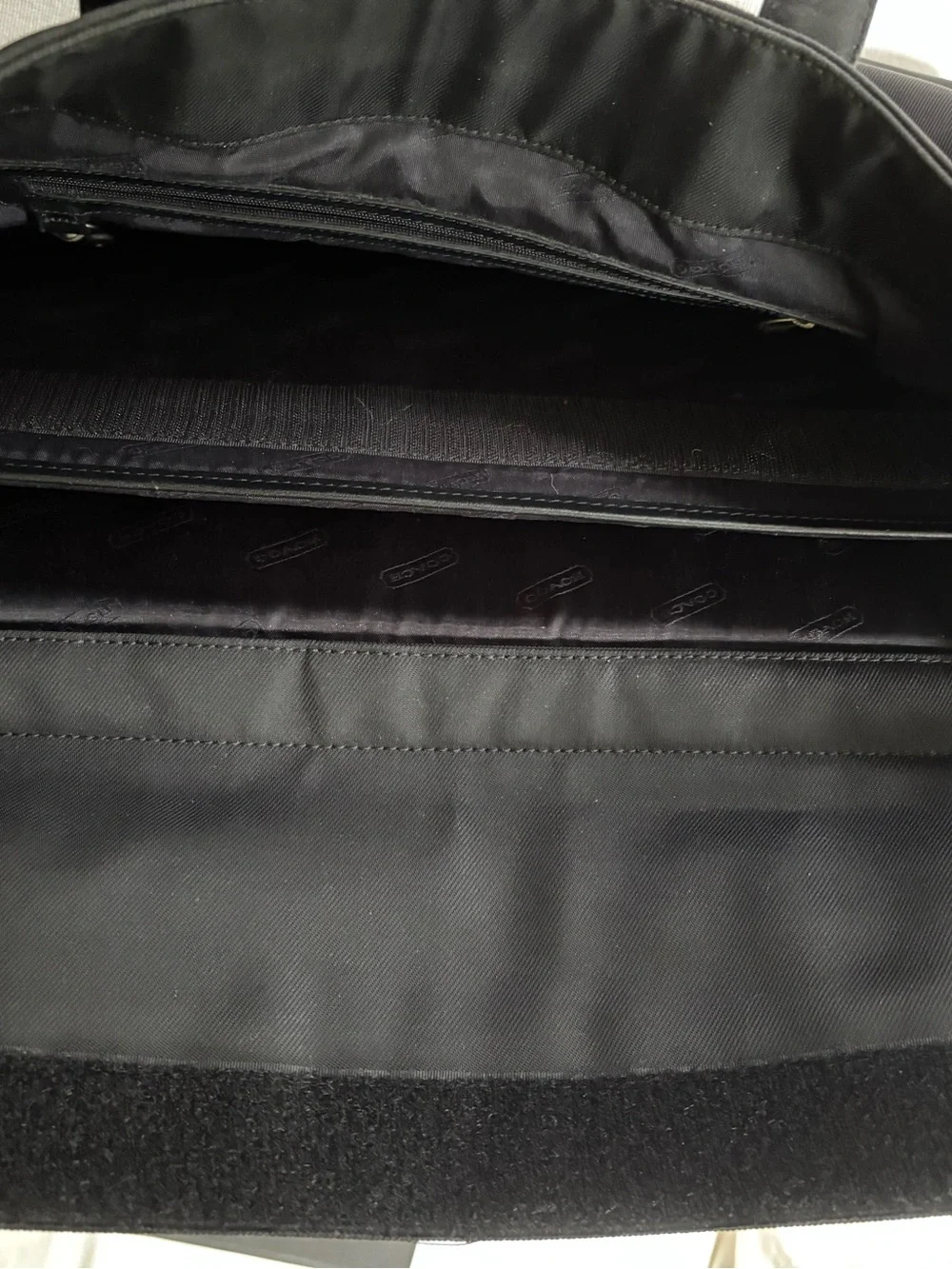 Coach Classic Women’s Laptop/Black Canvas Tote with Smooth Leather Handles.